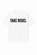 White t-shirt with 'TAKE RISKS.' text on a white background